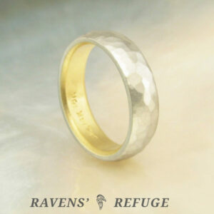 hammered white gold band with domed profile and yellow gold liner