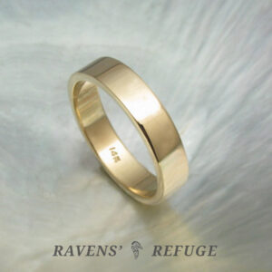 Plain 5mm wedding band with pipe cut profile in yellow gold