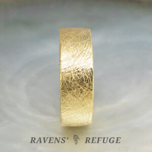 7mm 18k thick gold wedding band with textured finish