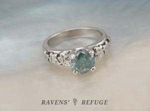 blue diamond leaf engagement ring
