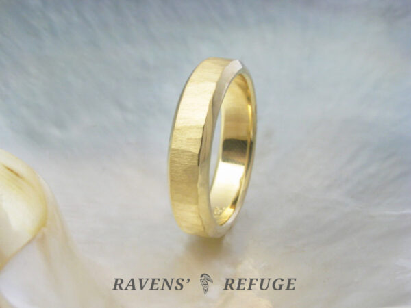 5mm wide 18k yellow gold wedding band with hammered matte center and steep beveled edges