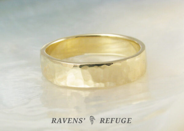 5mm custom wedding band in yellow gold with hand hammered finish