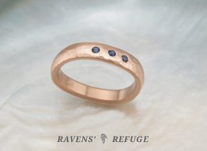 hammered ergonomic ring with sapphires