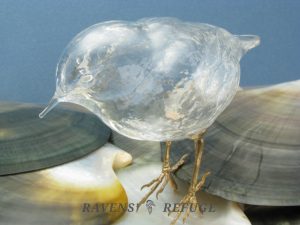 glass bluebird with bronze feet