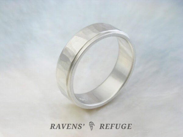 hammered white gold wedding band with stepped edges