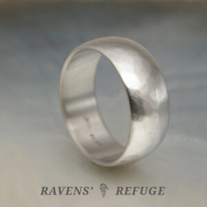 understated wedding band handmade in platinum with domed profile