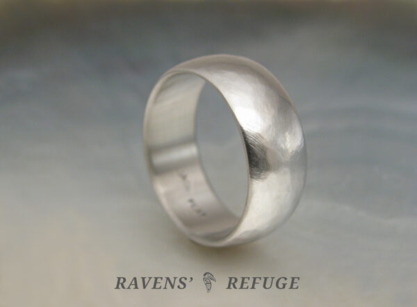 understated wedding band handmade in platinum with domed profile