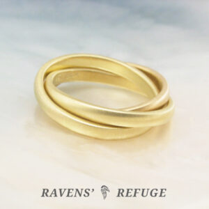 interlocking gold band ring