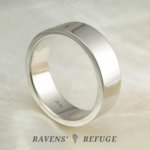 simple men's wedding ring hand forged in platinum