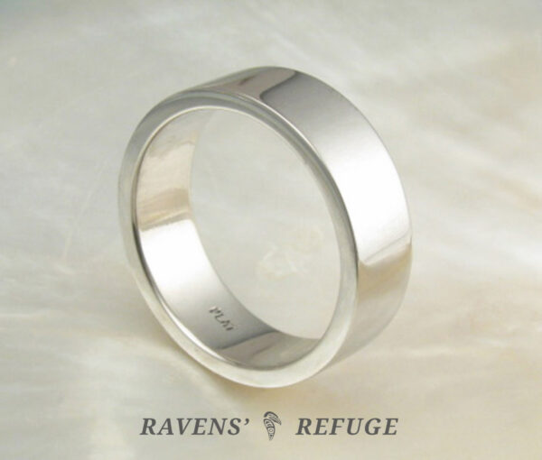 simple men's wedding ring hand forged in platinum