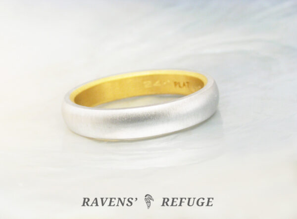 traditional platinum wedding ring, 4mm with domed profile and 24k gold liner