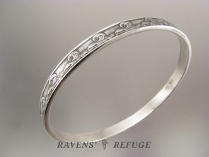 14k white gold bangle with custom wave design