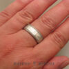 7mm platinum men's wedding band on hand