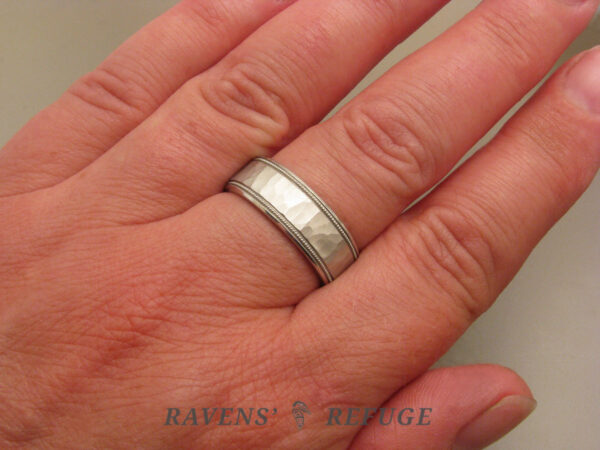 7mm platinum men's wedding band on hand